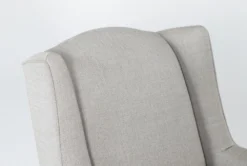 Bailey Linen Flare Arm Wing Skirted Swivel Glider 14 Bailey Linen Flare Arm Wing Skirted Swivel Glider -Furniture Store 244534 natural fabric accent chair detail 45