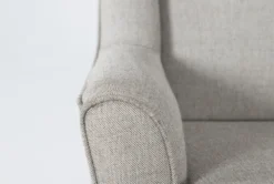 Bailey Linen Flare Arm Wing Skirted Swivel Glider 15 Bailey Linen Flare Arm Wing Skirted Swivel Glider -Furniture Store 244534 natural fabric accent chair detail 46